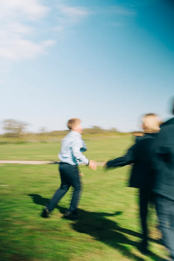 Student running across the school oval