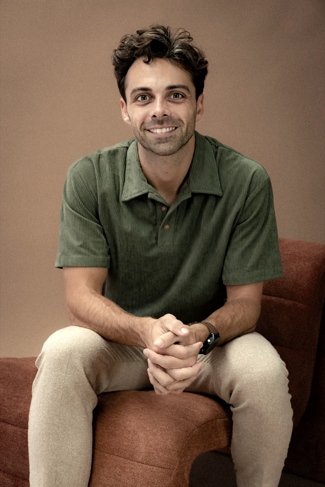 Jacob Shultz, seated, smiling